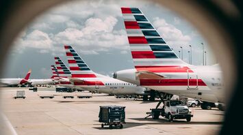 Vehicles near airplane