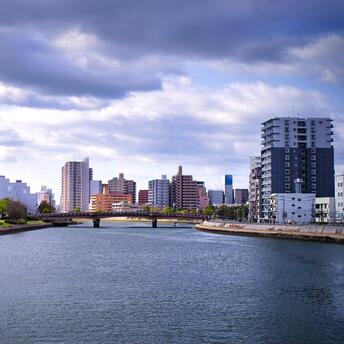 City ​​Hiroshima on the river bank with a bridge