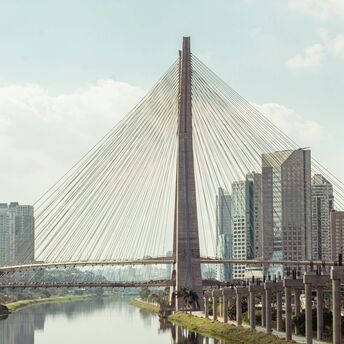 Gray concrete bridge over river