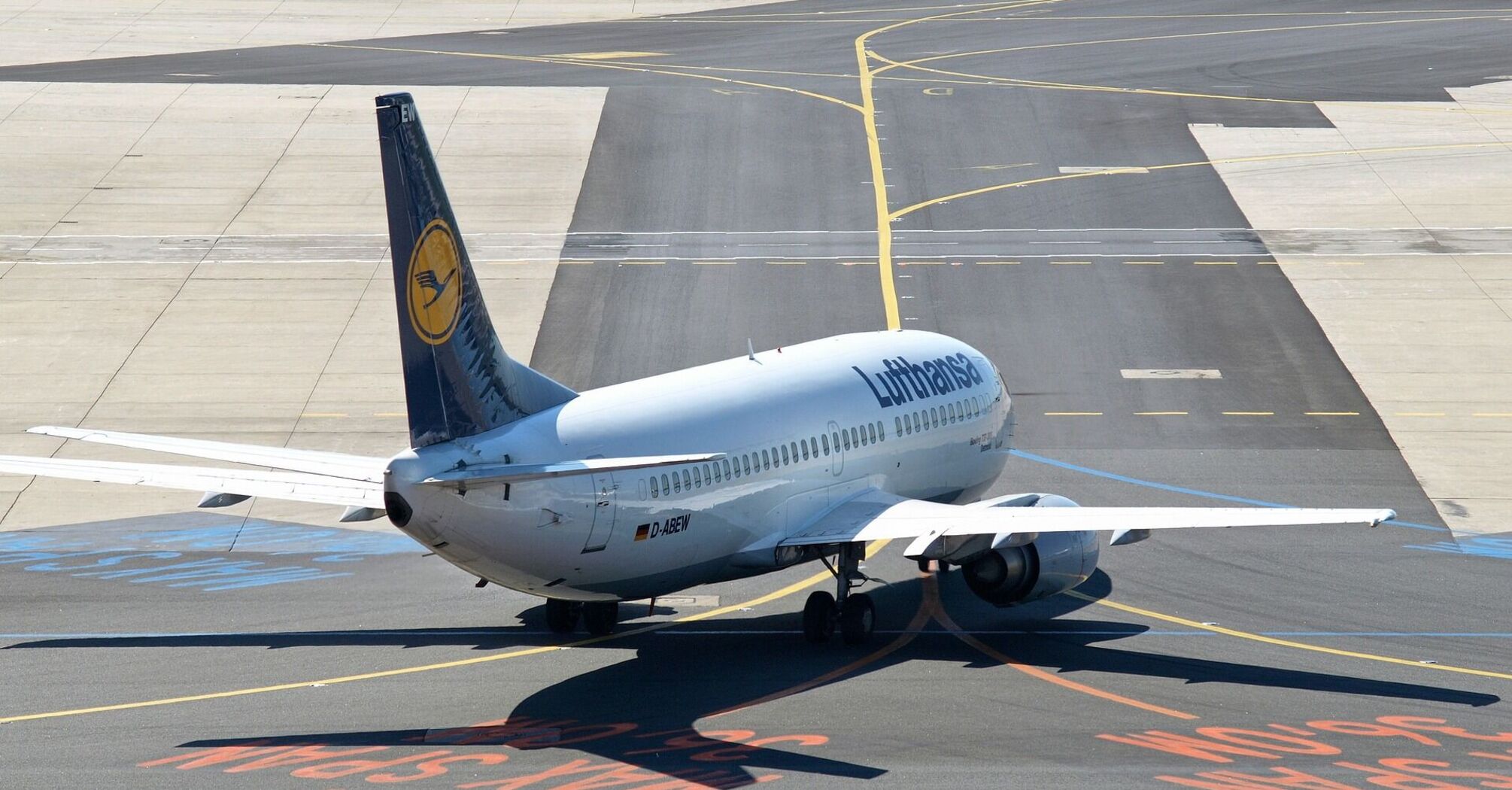 Lufthansa airplane on the tarmac at an airport