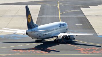 Lufthansa airplane on the tarmac at an airport