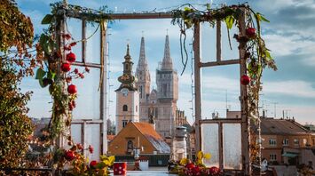 View of Zagreb Cathedral through a decorative frame with Christmas ornaments