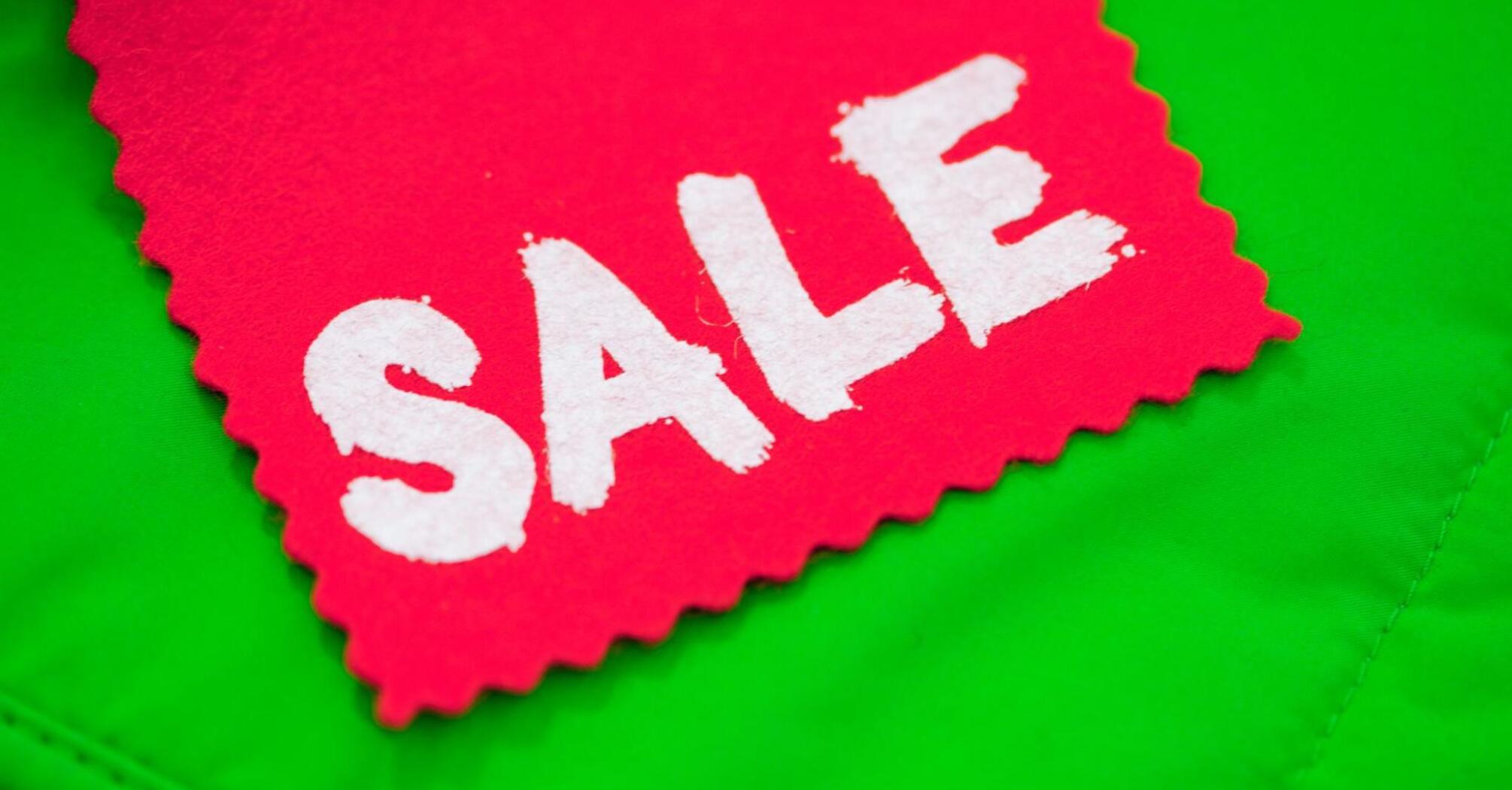 Sold out sign on green background