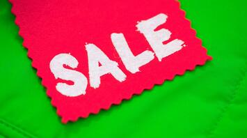 Sold out sign on green background