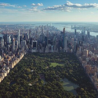 Aerial view of Central Park surrounded by Manhattan skyscrapers in New York City
