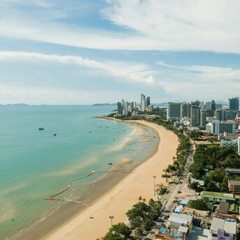Aerial view of Pattaya cityscape with beach and sea