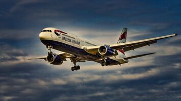 British Airways plane flying in the sky
