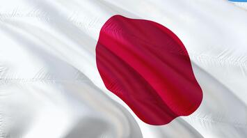 Japan flag against blue sky 