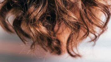 Curly brown hair close-up