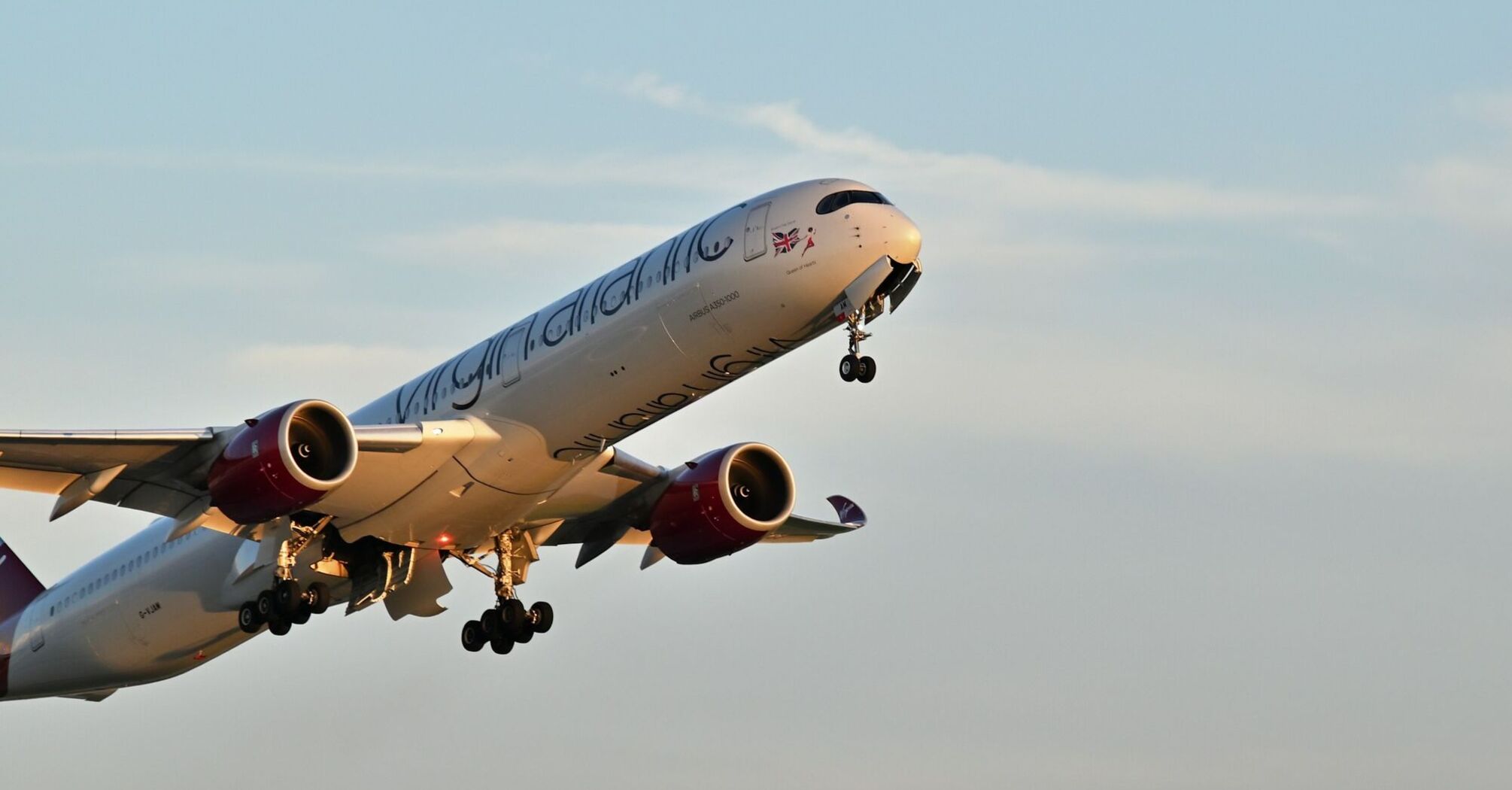 Virgin Atlantic airplane flight against a clear sky