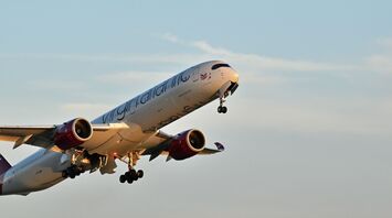 Virgin Atlantic airplane flight against a clear sky