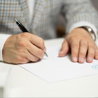 Man signing important documents