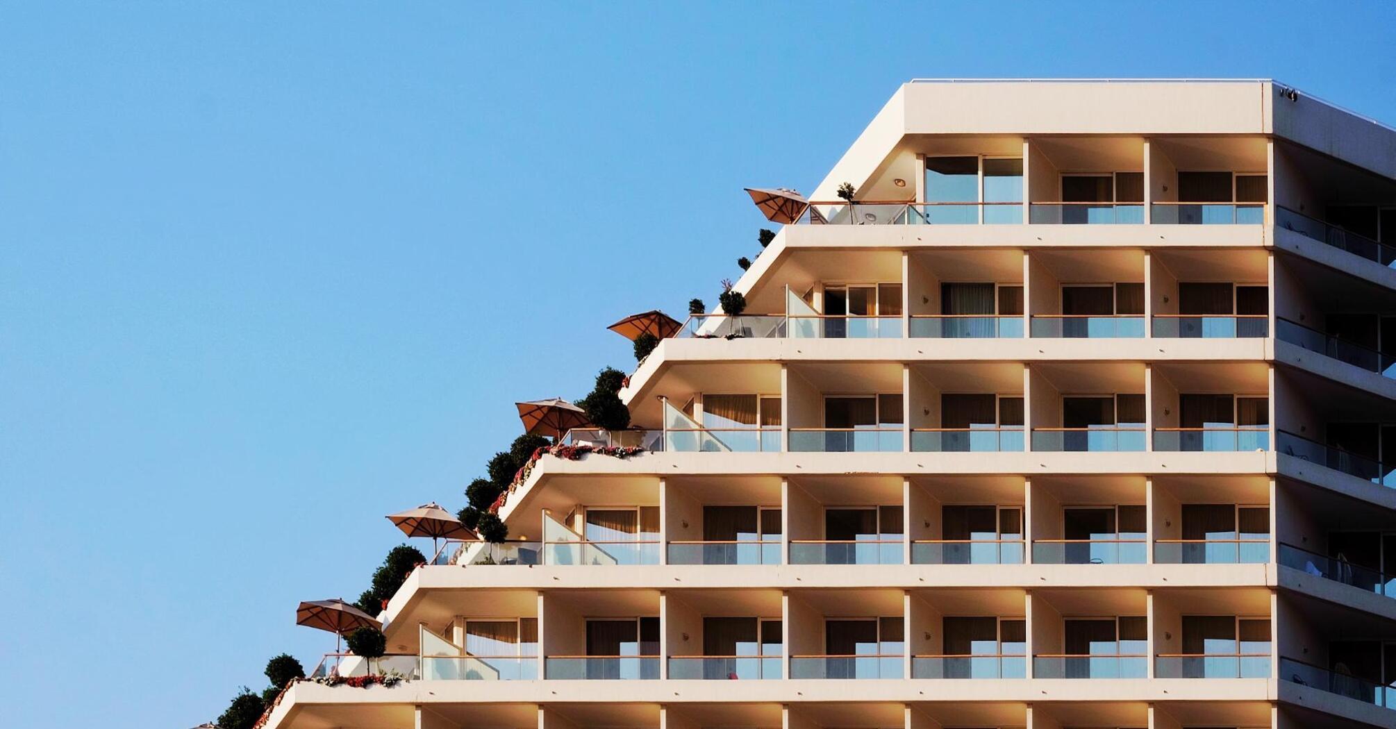 Triangular hotel with green terraces