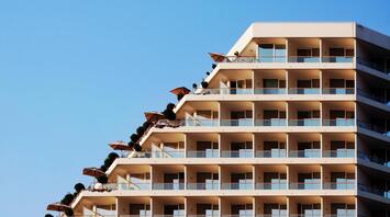 Triangular hotel with green terraces