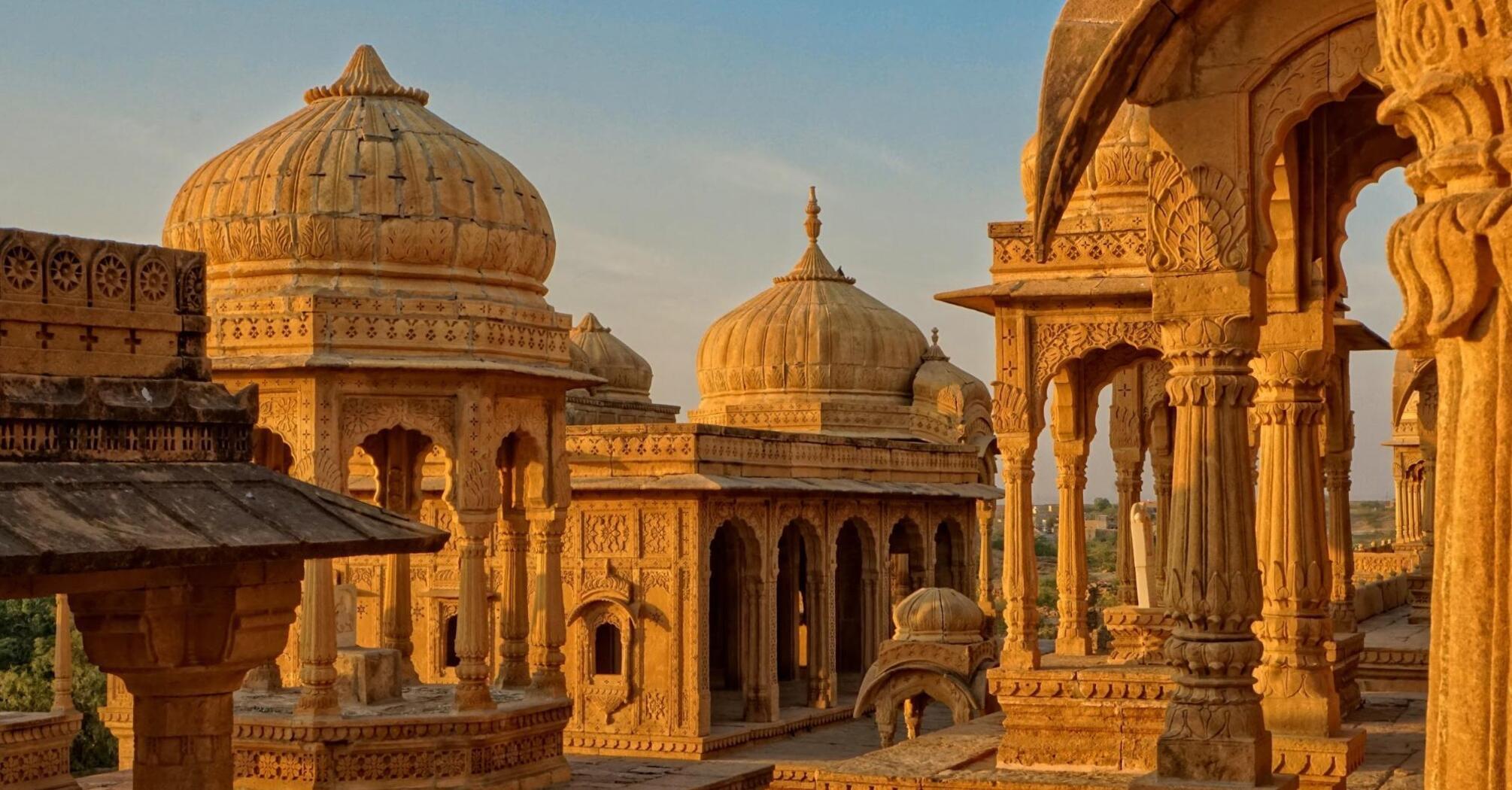 Stone temple in India at sunset 