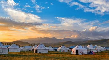 White tents near mountain at daytime
