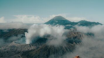 Aerial view of mount with surrounding clouds