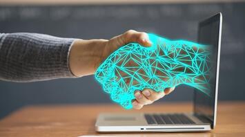 A man shakes his hand through a computer screen