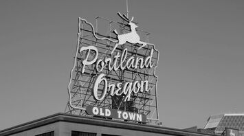 Grayscale photo of unks coffee shop