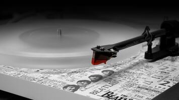 Record player with the inscription of favorite band