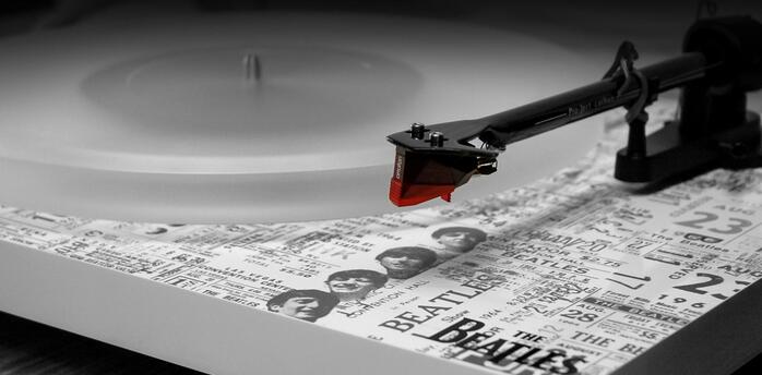Record player with the inscription of favorite band