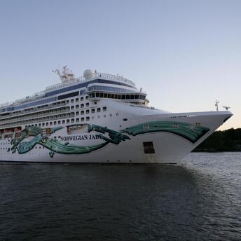 Huge cruise ship in all its glory in the middle of the sea