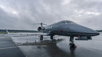 A jet sitting on top of an airport tarmac