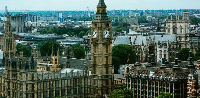 The Houses of Parliament and Big Ben in London with the cityscape in the background