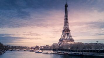 Eiffel Tower at sunset with a view of the Seine River
