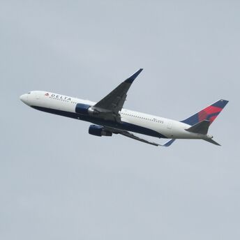 Delta Airlines plane flying in the air