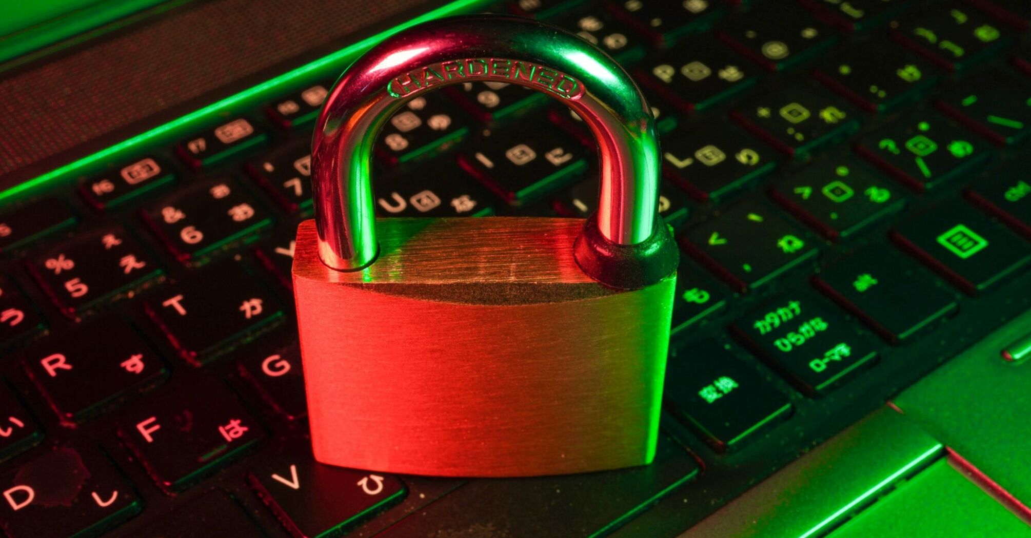 A red padlock on a computer keyboard, symbolizing cybersecurity