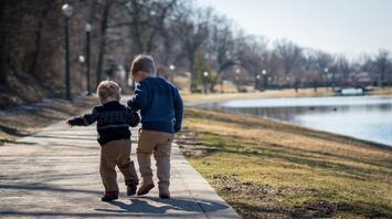 Two children in the autumn park