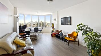 Hotel room with a view of the city
