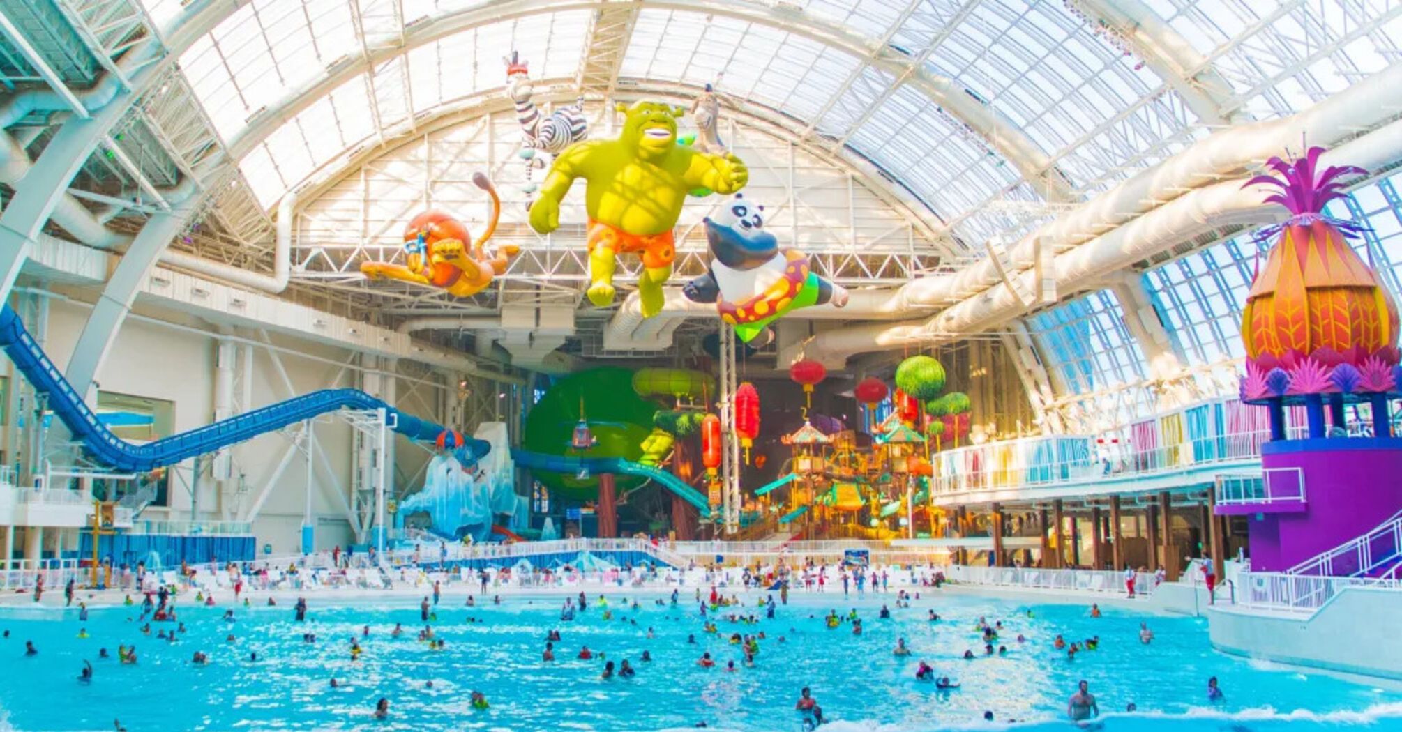 The best indoor water parks in the US for year-round summer vacations. Places to ride big water slides and waves