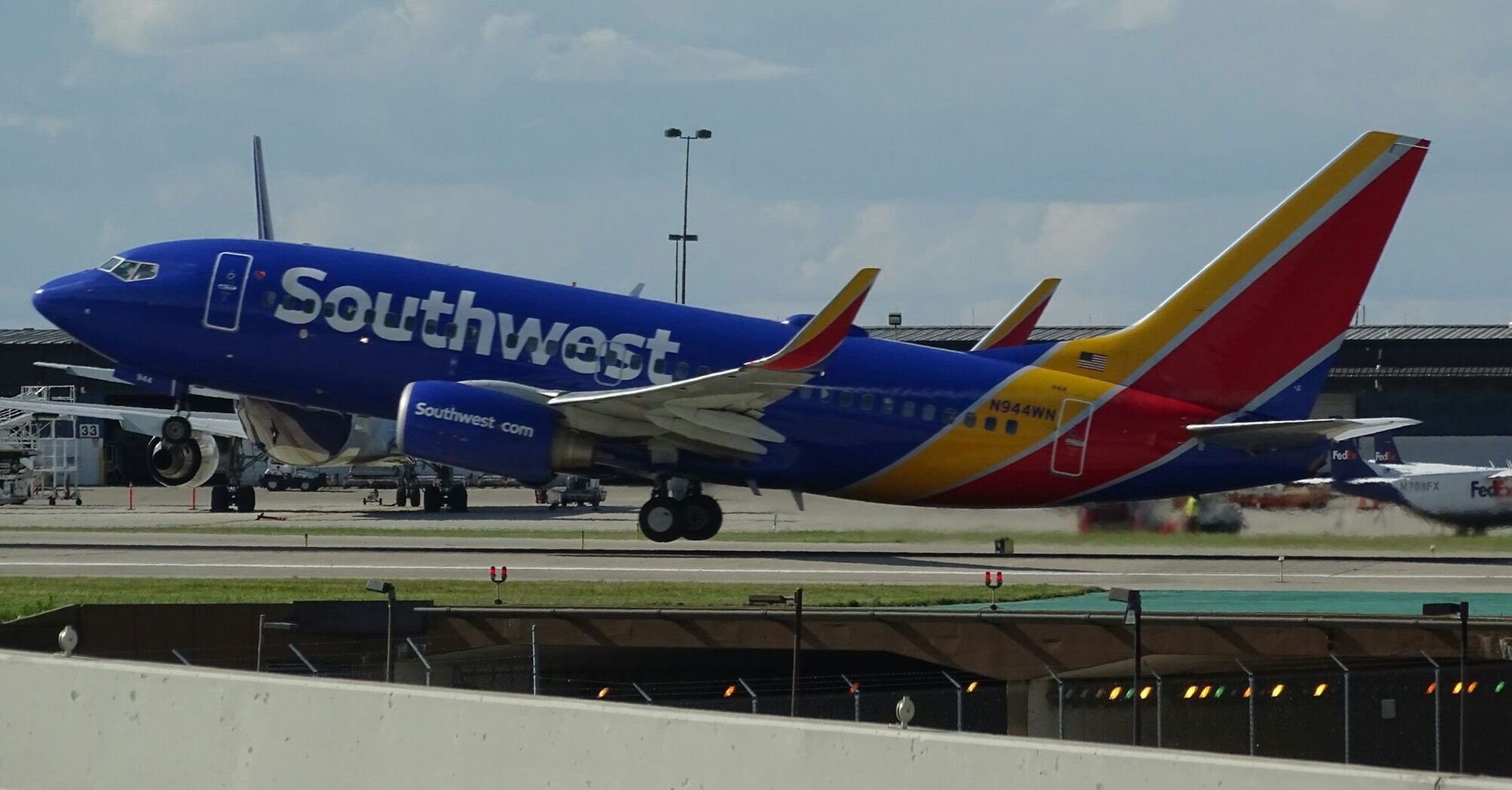 Southwest Airlines airplane mid-flight with landing gear down