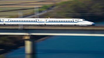 Fast train is going over the bridge