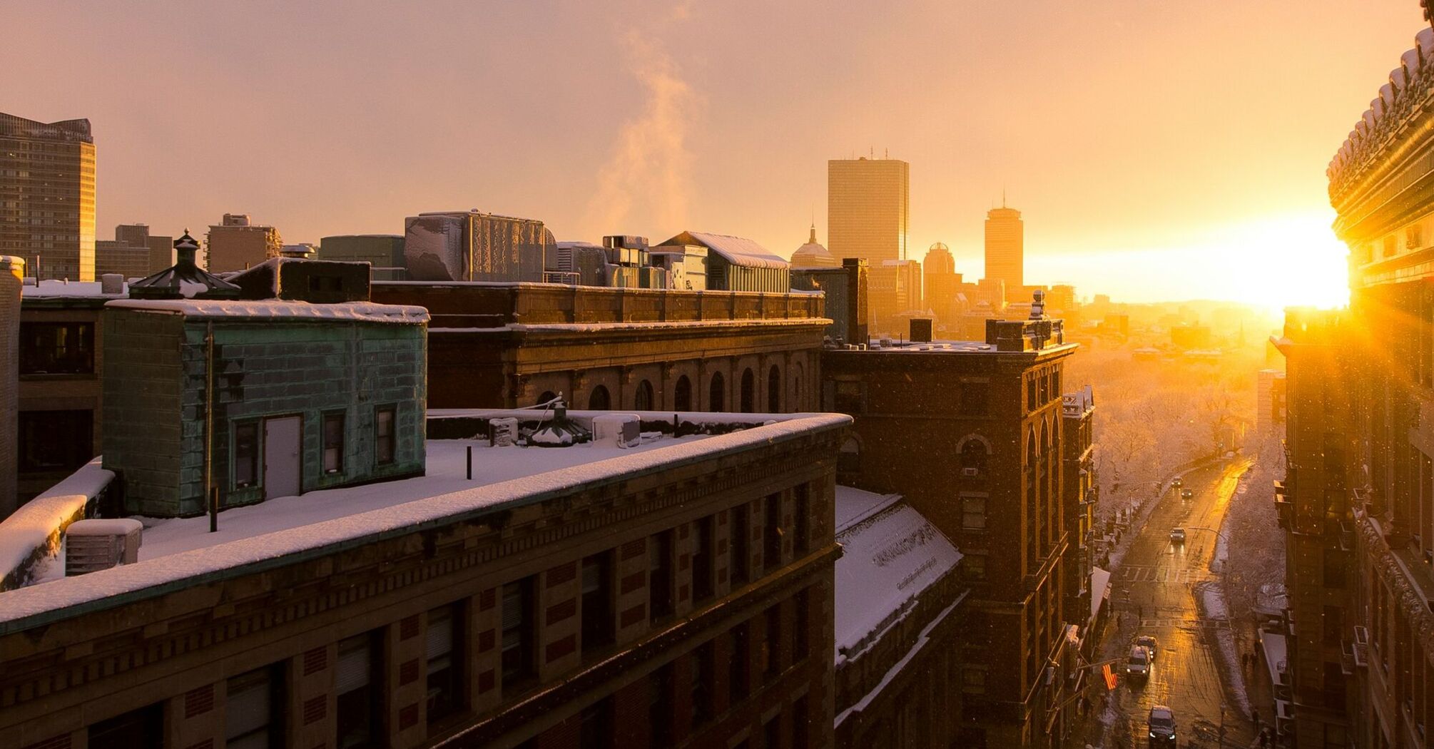 Sunrise over a snowy Boston skyline