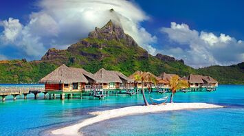 Small bungalows standing right in the water