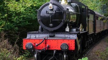 Steam train on a railroad