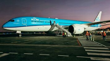 KLM Royal Dutch Airlines Boeing aircraft parked on the tarmac during twilight