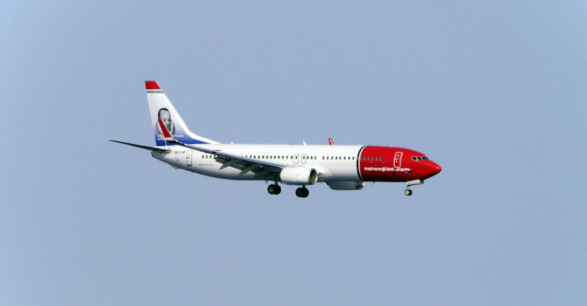 Norwegian Air Shuttle airplane in flight