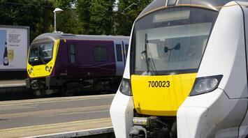 Two Thameslink trains on the station