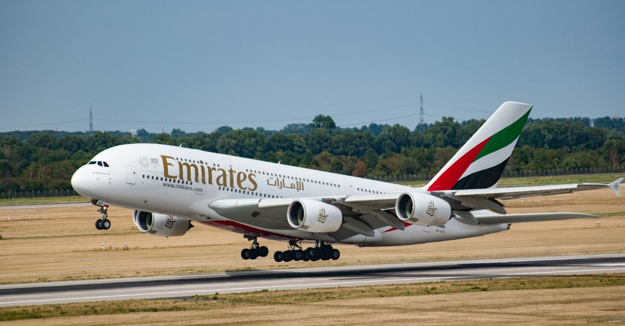 An Emirates Airbus A380 taking off from a runway