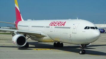 An Iberia aircraft parked on the tarmac
