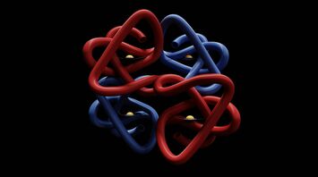 A red blue and black object with a black background