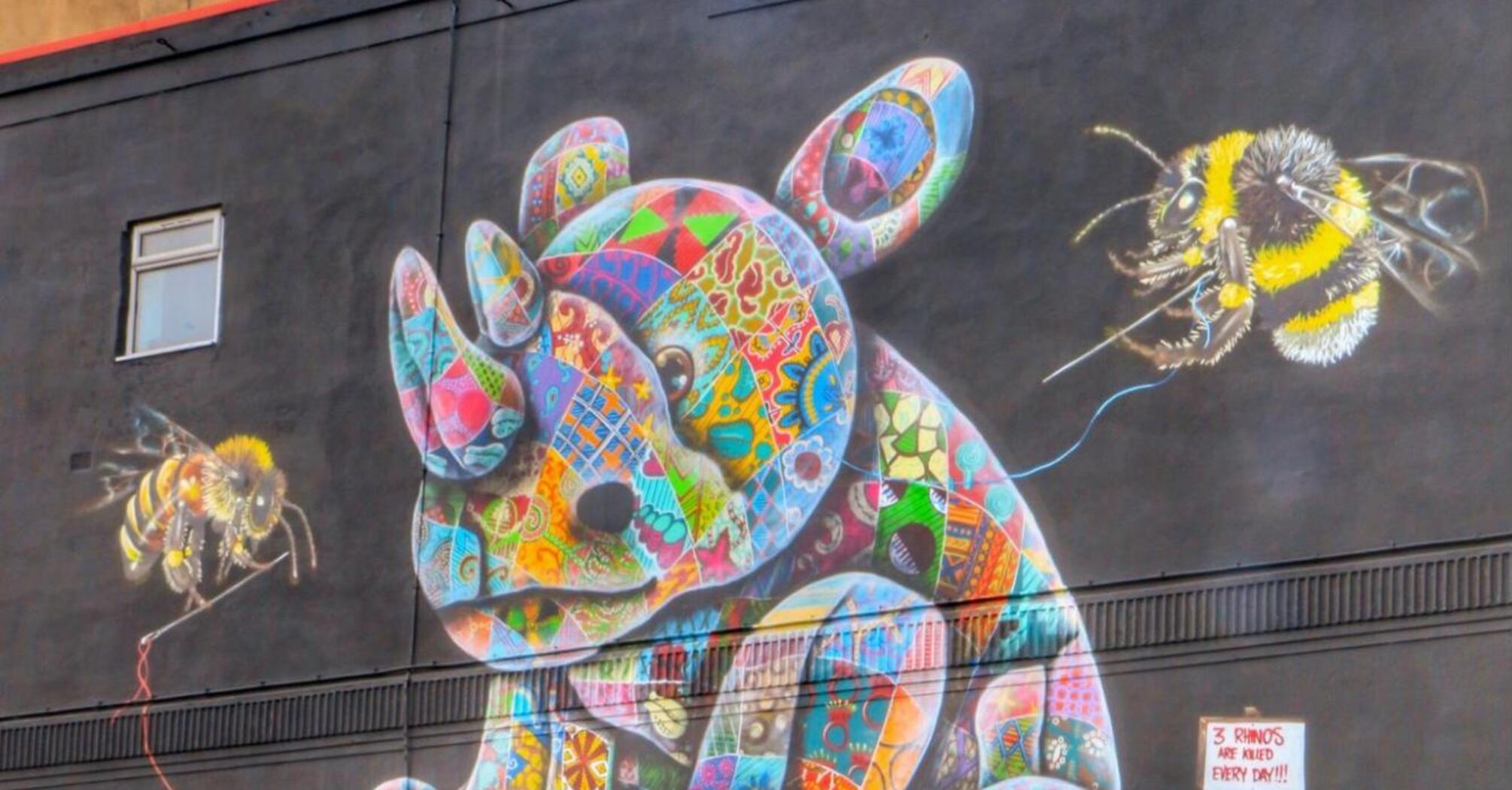 A mural of a patchwork rhinoceros