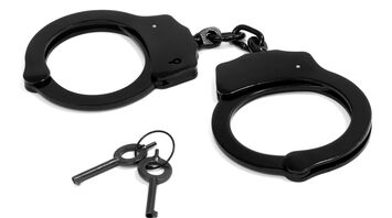 Black handcuffs with keys