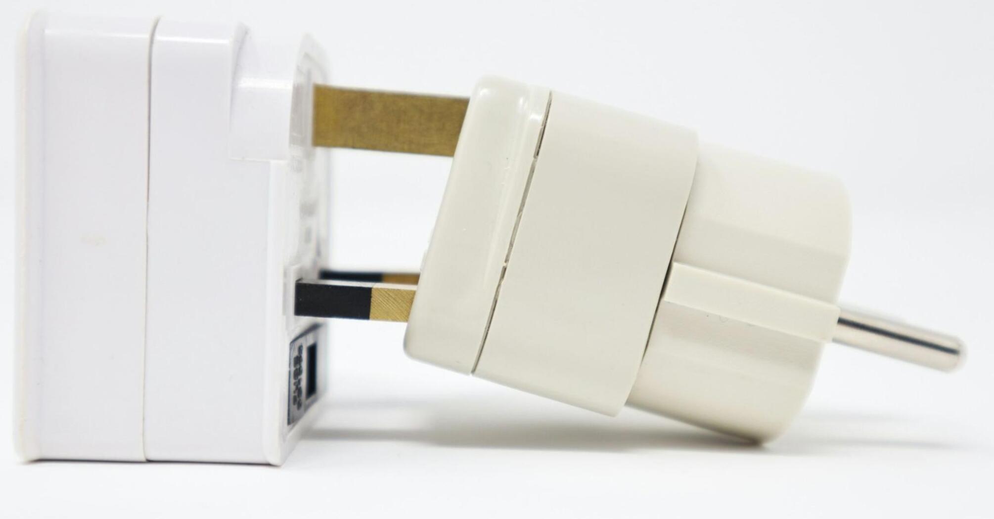 A white adapter and a plug