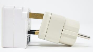 A white adapter and a plug