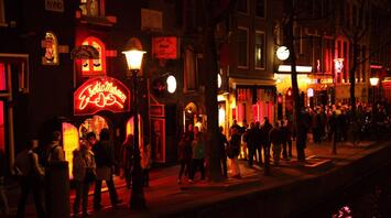 Late night crowded street in Amsterdam